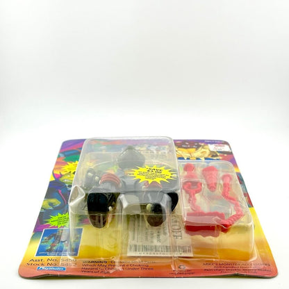 Toy figure in packaging with colorful background