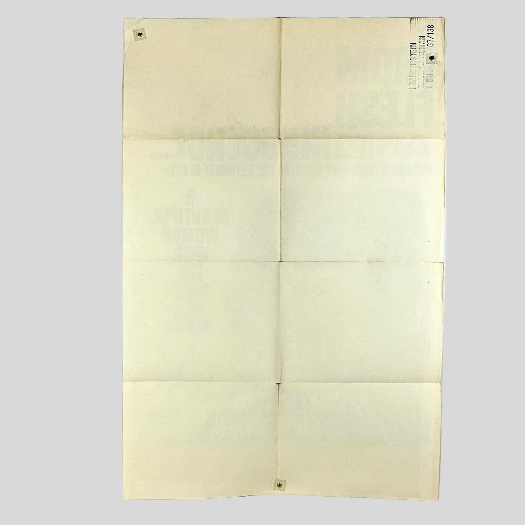 Backside of poster to show damage and printing on back.