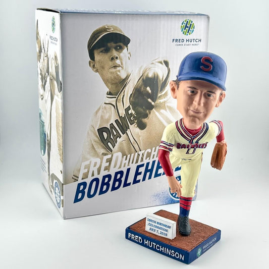 Baseball bobblehead figure with packaging featuring a vintage player image, displayed on a white background.