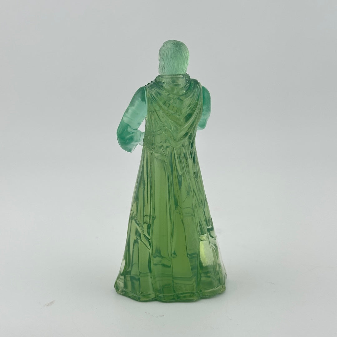 Green glass-like figurine of Obi-Wan Kenobi on a white background