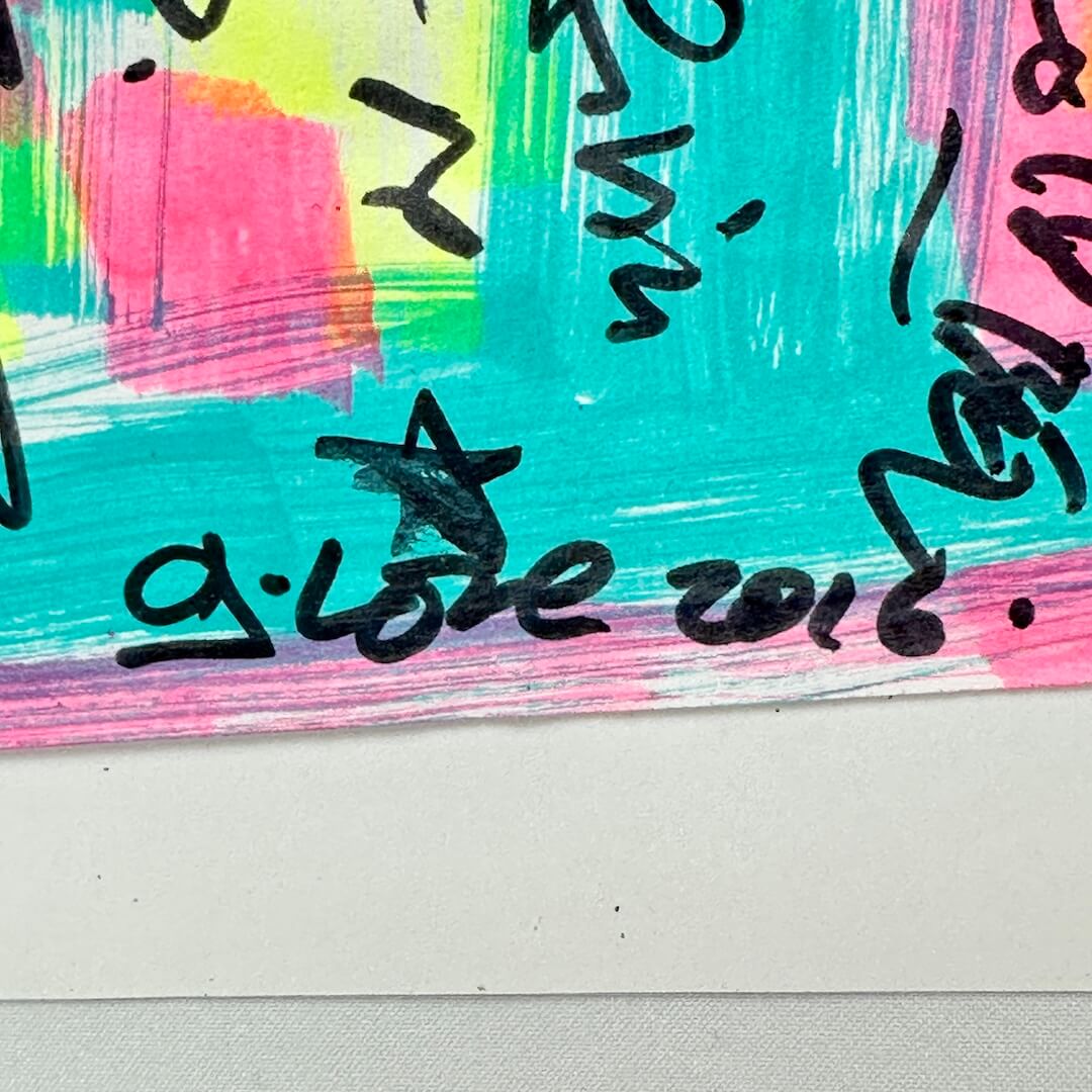 Close-up of G.Love signature on side of setlist. 