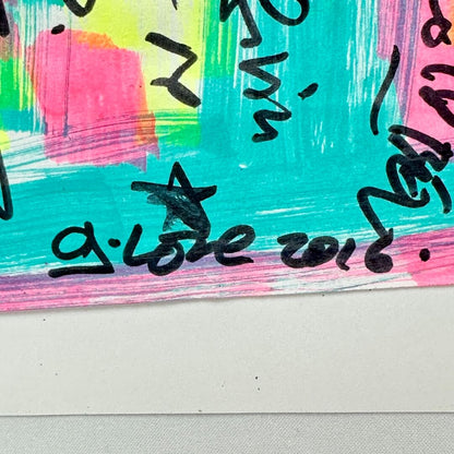 Close-up of G.Love signature on side of setlist. 