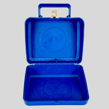 Blue lunchbox with a handle on a gray background