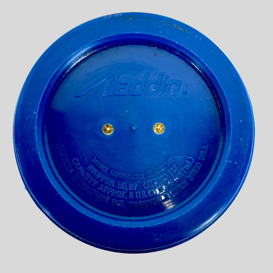 Blue Aladdin container lid on a white background