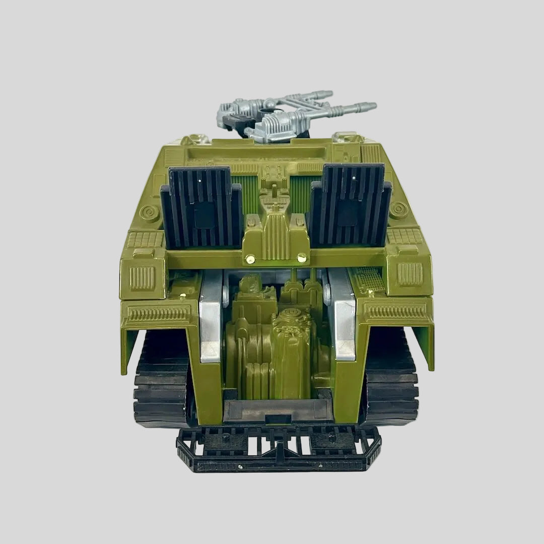 Green and gray toy tank with black accents on gray background. 