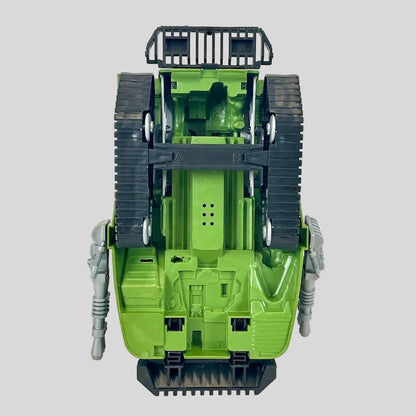 Underside of toy tank with black accents on gray background. 