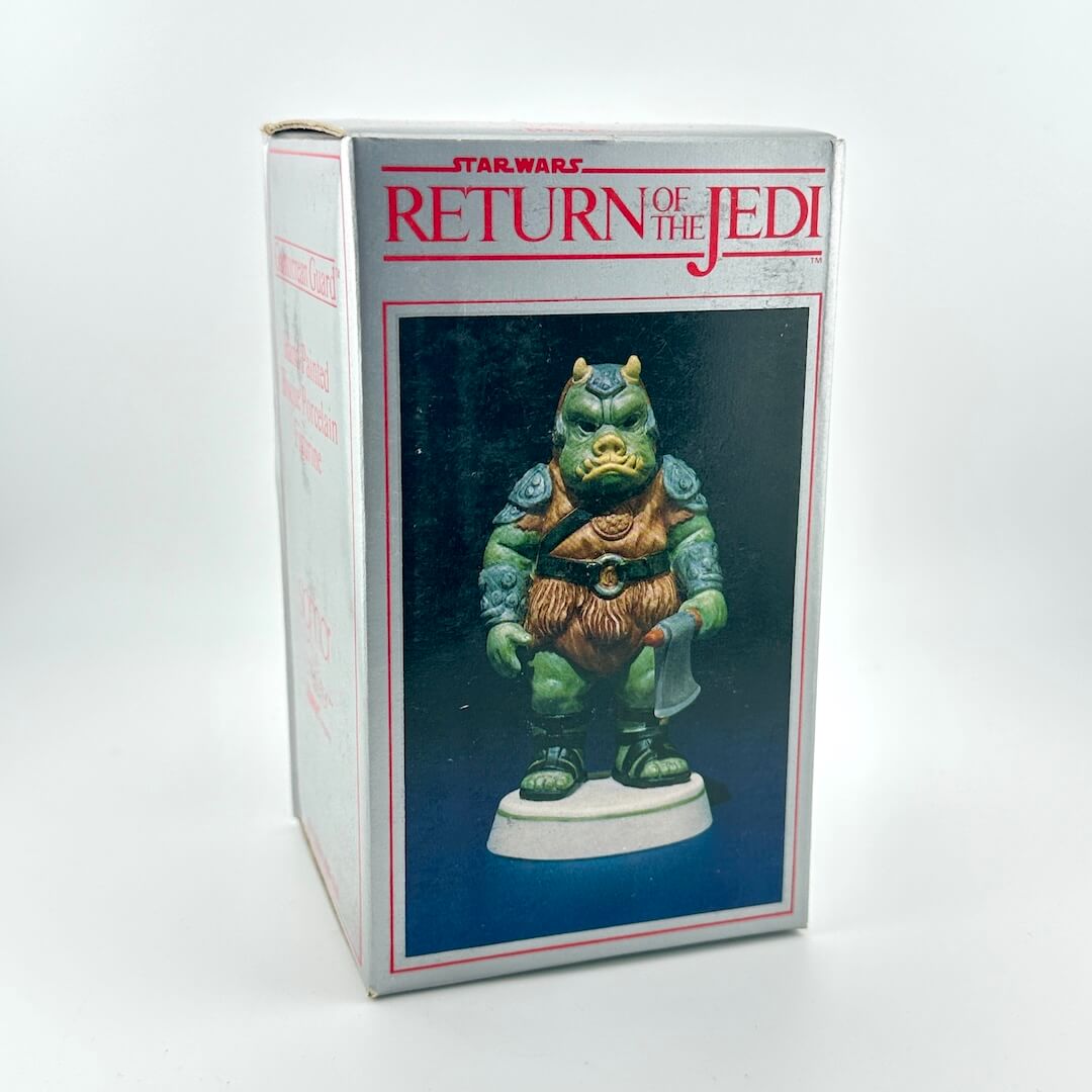 Boxed figurine from 'Star Wars: Return of the Jedi' on a white background
