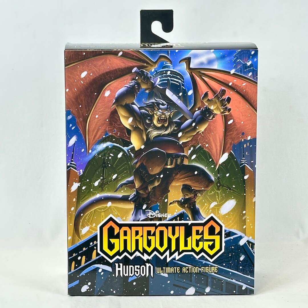 Boxed action figure of a gargoyle from 'Gargoyles' with colorful design on a white background