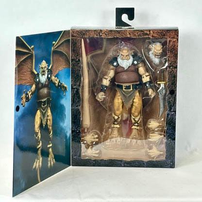 Action figure in packaging with a gargoyle illustration on the side
