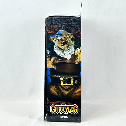 Boxed toy figure of a character from 'Gargoyles' with NECA branding on a white background