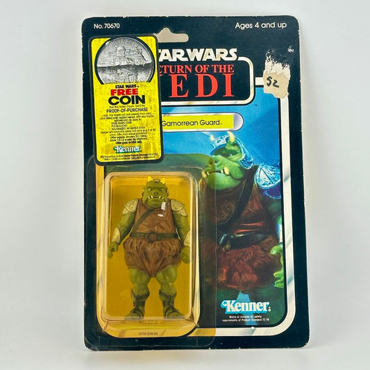 Vintage Star Wars action figure packaging with character and coin ad on a white background