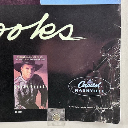 Record cover with a portrait of a person wearing a cowboy hat and the Capitol Nashville logo.