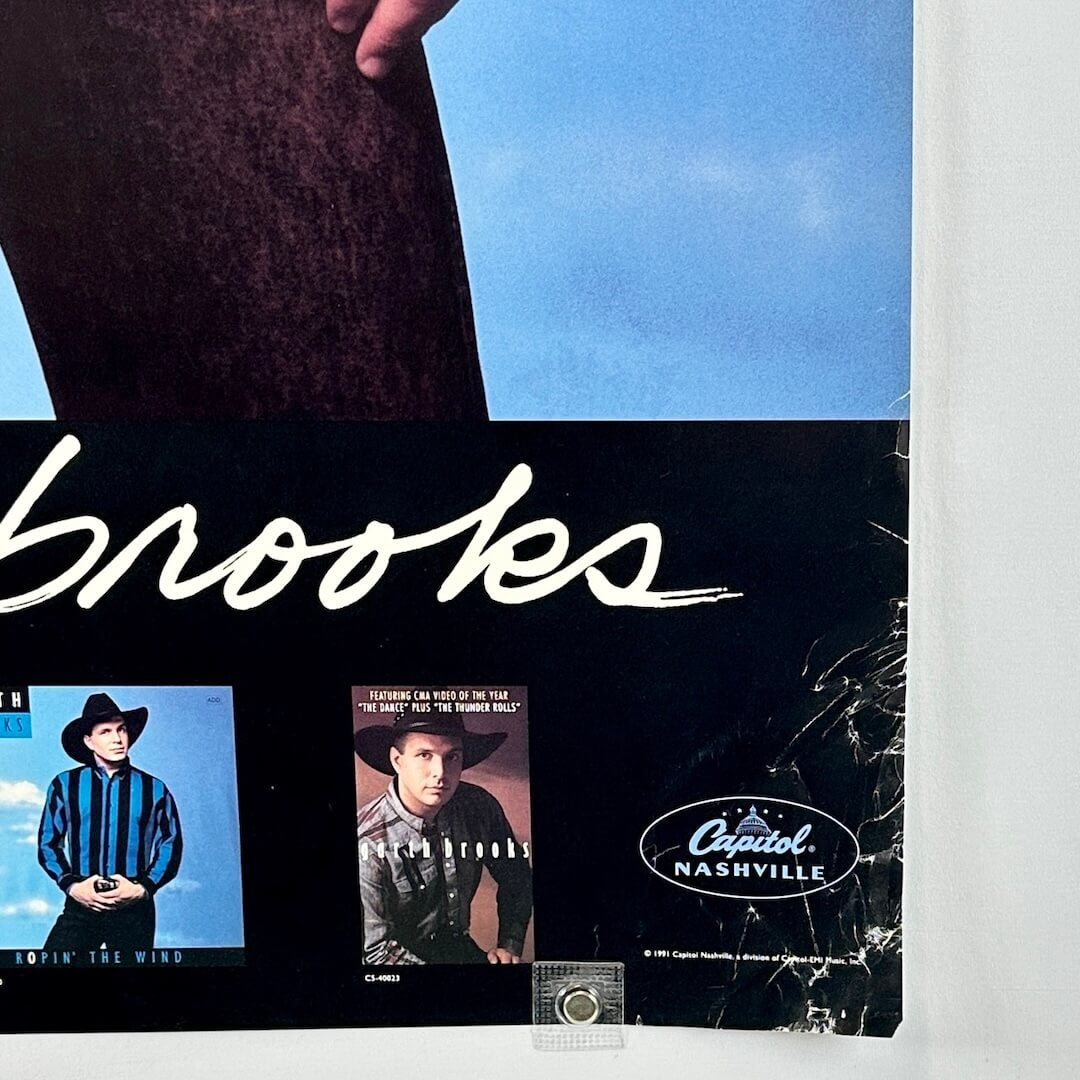 Album cover with 'Capitol Nashville' logo and images of a person wearing a cowboy hat.