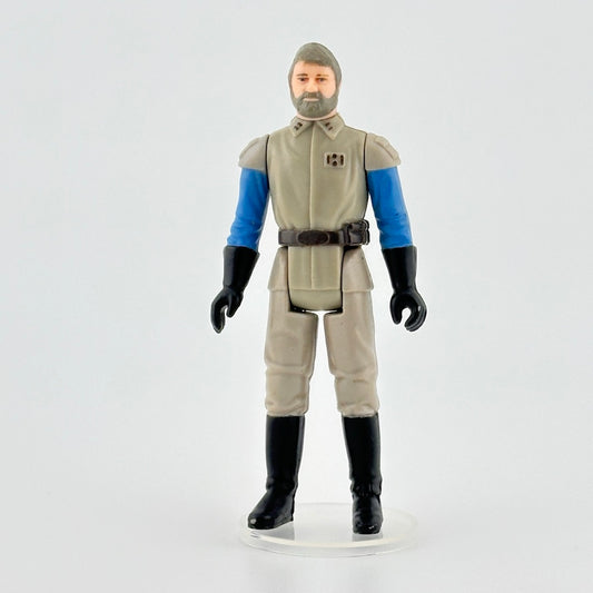 Image of 3-inch figure of man with grey hair & beard, a grey uniform with blue sleeves, black gloves & boots. Belt at waist.