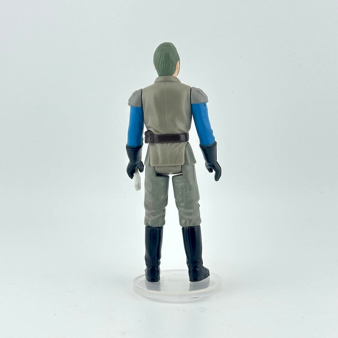 Action figure in a gray, black, and blue uniform with white staff, on a white background