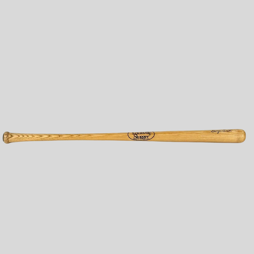 Wooden baseball bat with branding on a white background