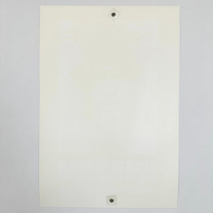 Backside of white poster showing zero damage against white background. 