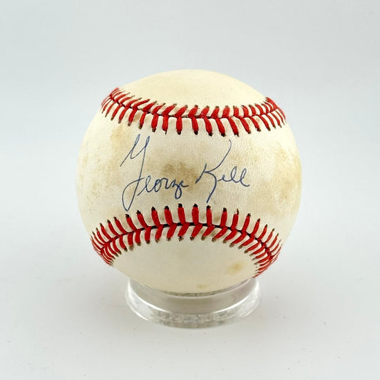 Baseball with autograph on a white background