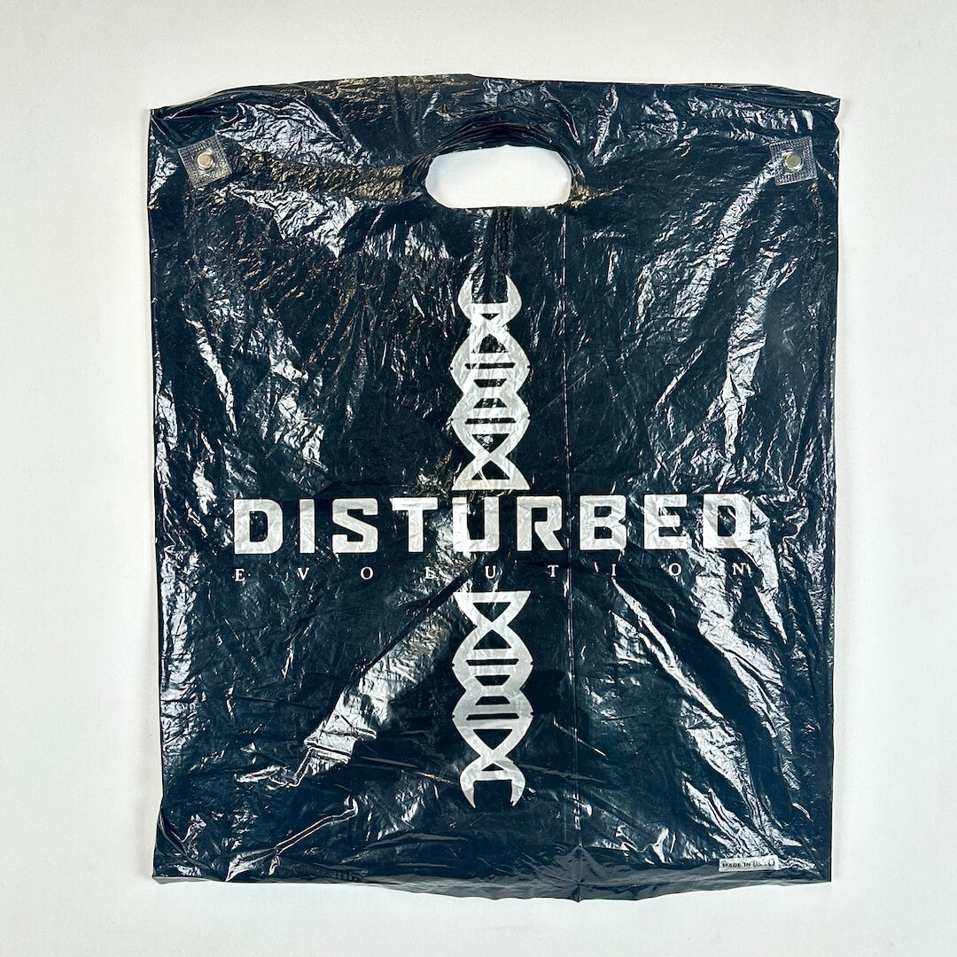 Black plastic bag with 'Disturbed' logo and DNA design on a white background