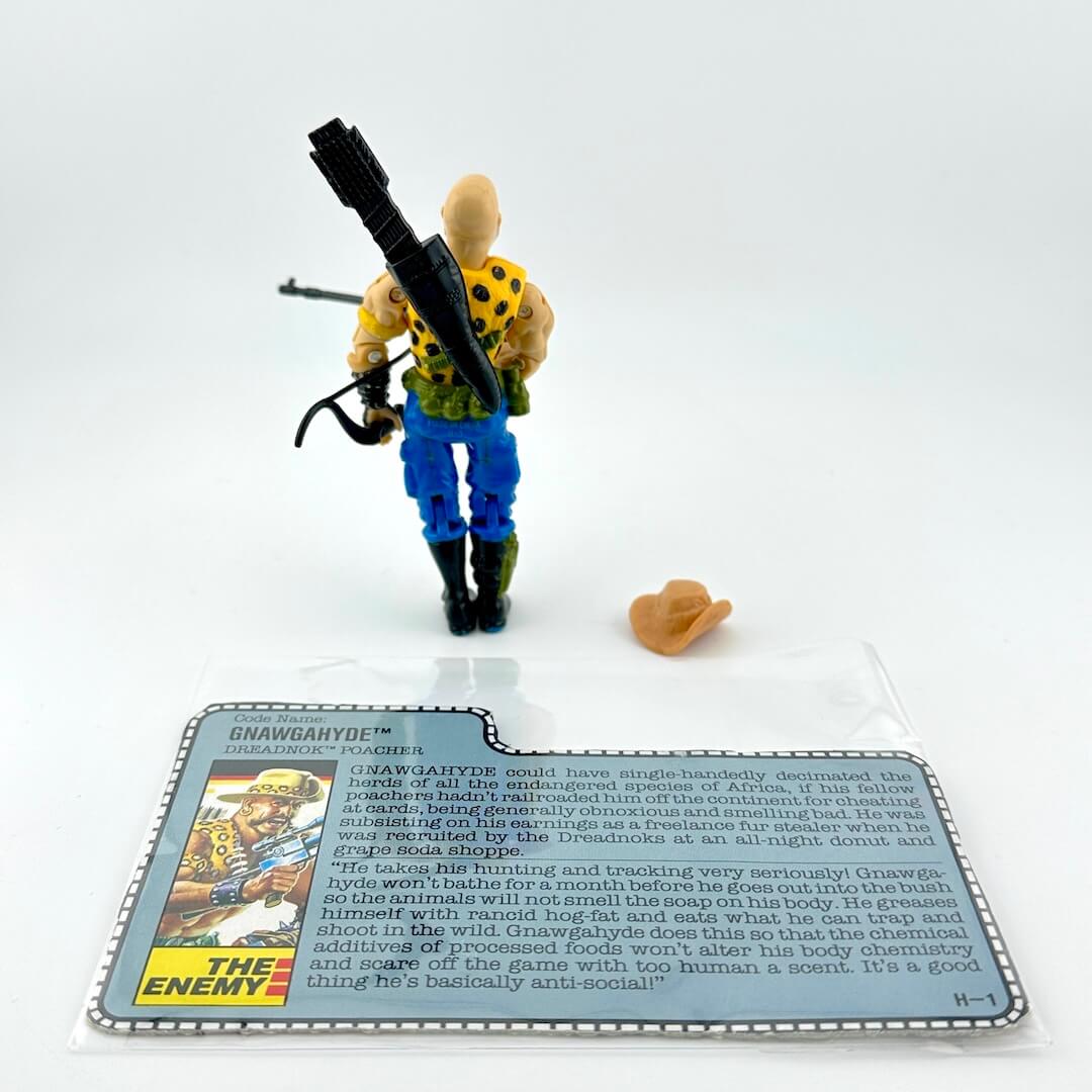 Toy figure with a card on a white background