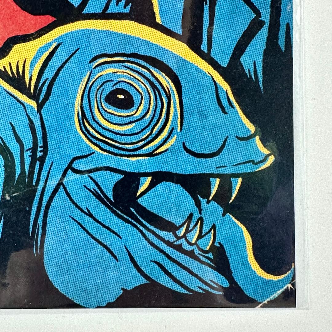 Lower right corner of print with sharp corner and undamaged edge, wrapped in plastic. 