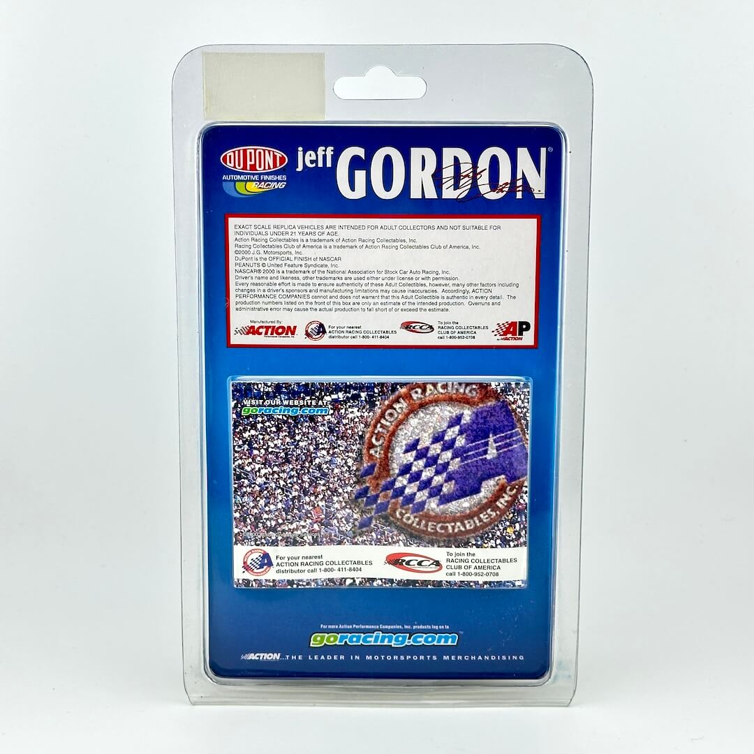 Jeff Gordon diecast car in its original clear blister packaging, featuring a blue backing card.