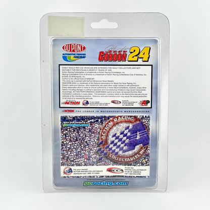Back of 1:64 scale stock car in original blister packaging, featuring product information and DuPont and Action logos.