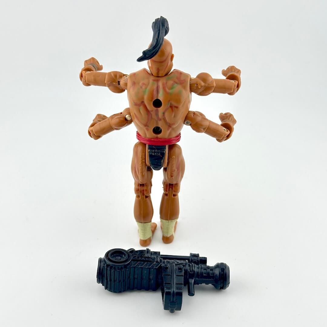 GI Joe/Mortal Kombat action figure with four arms and ponytail, in loincloth, pictured with accessory.