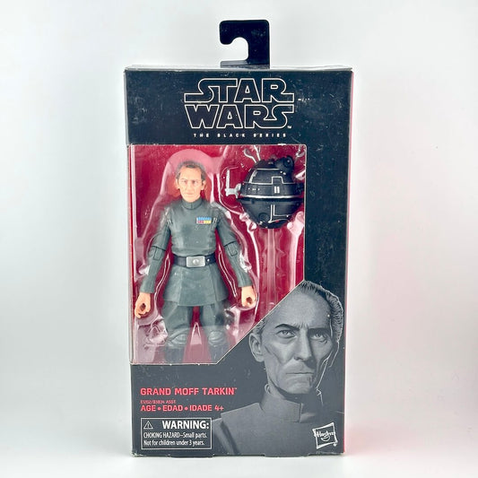 Star Wars action figure in its original retail packaging with window showing figure in gray uniform. 