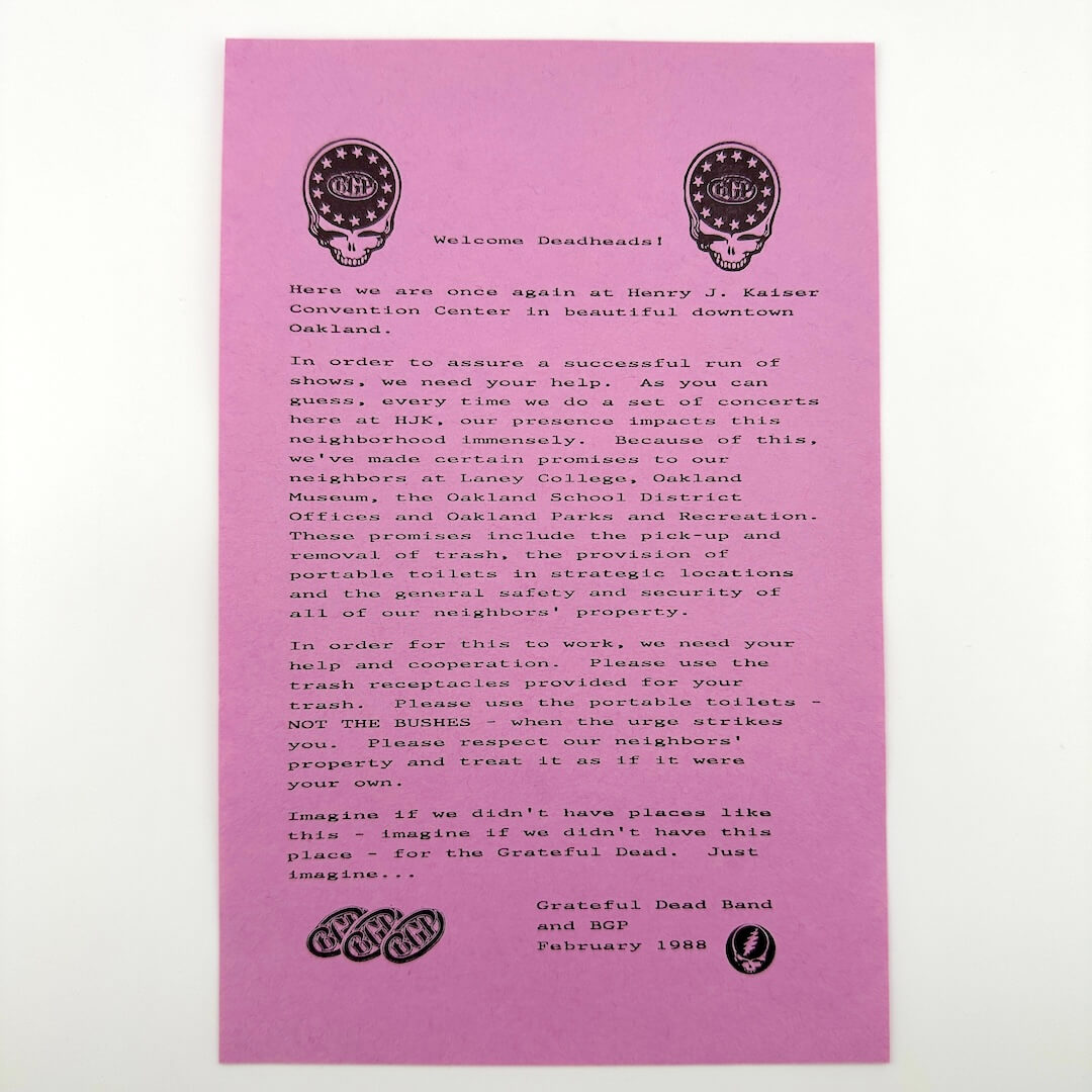 Purple handbill with text and Grateful Dead logo on a white background
