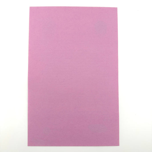 Backside of purple handbill in mint condition against white background. 