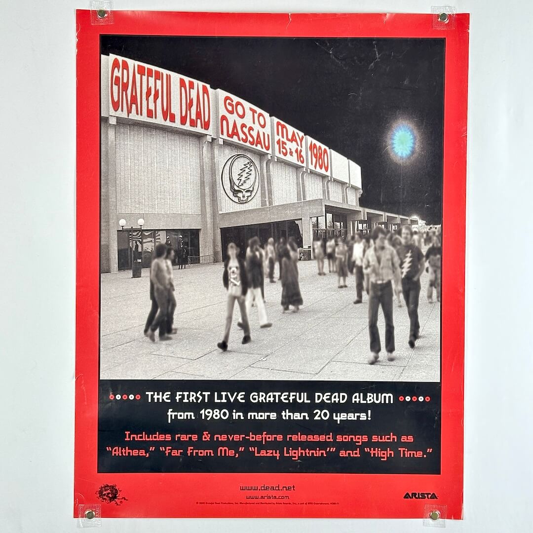 Promotional poster for Grateful Dead concert at Nassau Stadium, featuring a crowd and event details.