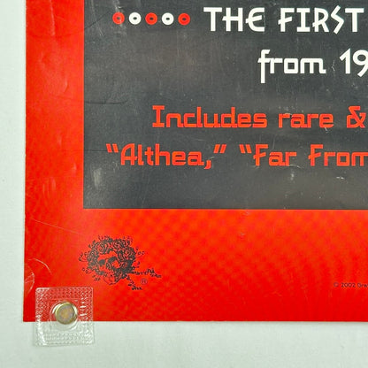 Bottom left corner with Grateful dead logo and some wear.