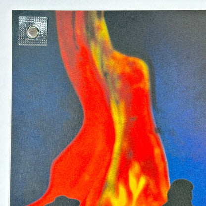 Top left corner of poster showing no damage. 