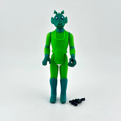 Green alien action figure with small black accessories on a white background