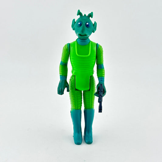Green alien action figure holding a gun on a white background