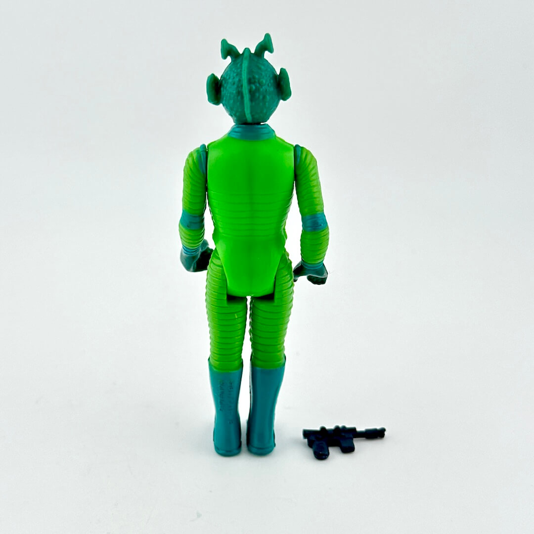 Green and blue action figure on a white background