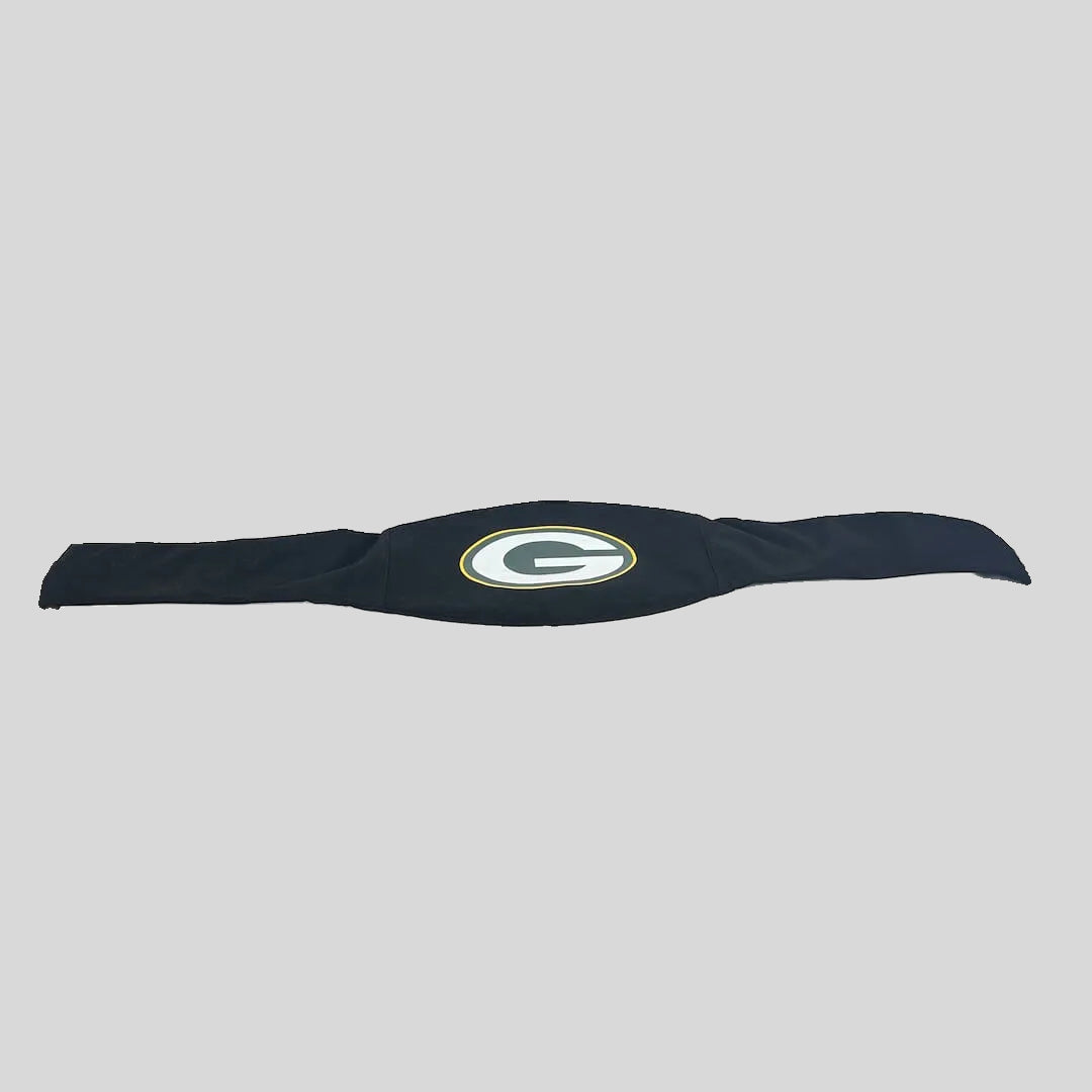A black fabric item with a Green Bay Packers 'G' logo, laid flat on a gray background. 