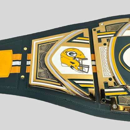A Green Bay Packers themed belt featuring the team's yellow helmet logo, green and gold metallic accents, and a dark green strap, shown on a light gray background.