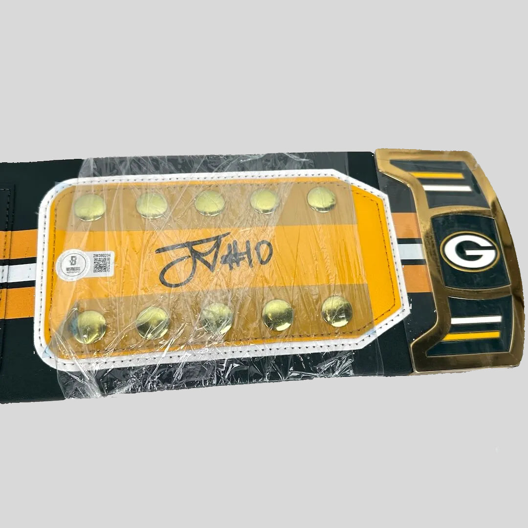 Close-up of Love's signature section with Beckett authentication sticker. 