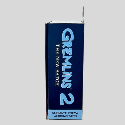 Box for Gremlins 2 with blue text on a gray background