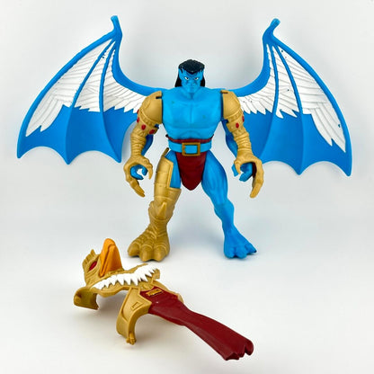 figure of winged creature with gold armor on white background. 