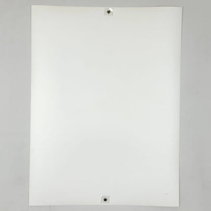 Backside of white poster against white background. 