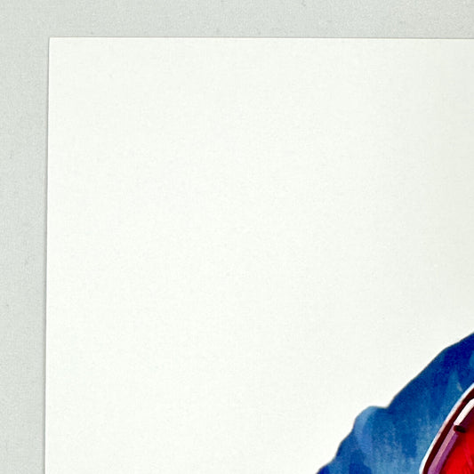 Upper left corner of poster with no damage. 