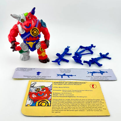 TMNT action figure with card back and accessories against white background. 