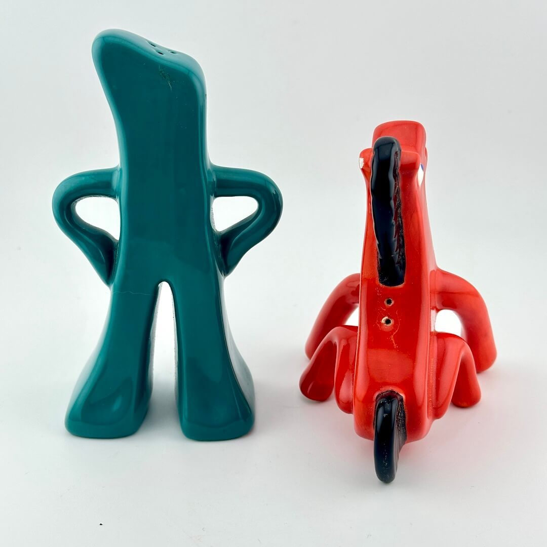 Back view of salt and pepper shaker set shaped like Gumby and Pokey. 