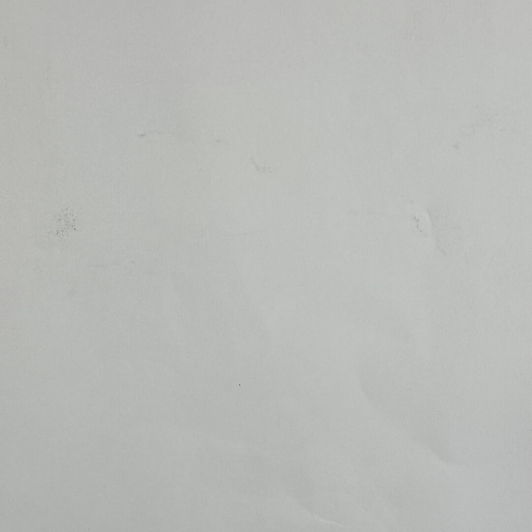 Backside of poster with a few creases. 