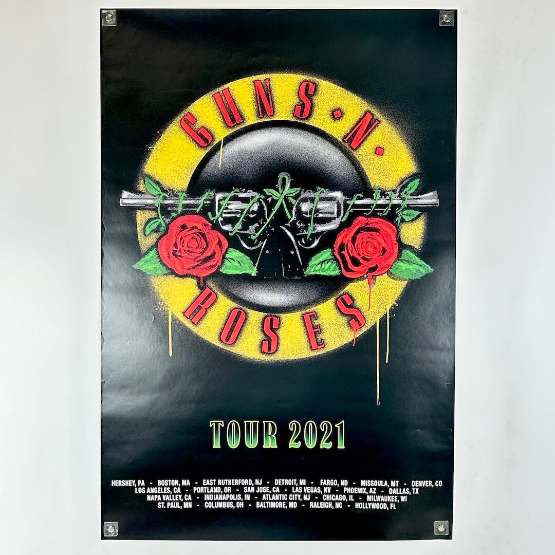 Guns N' Roses tour poster with logo and event dates on a dark background