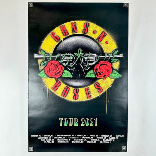 Guns N' Roses tour poster with logo and event dates on a dark background