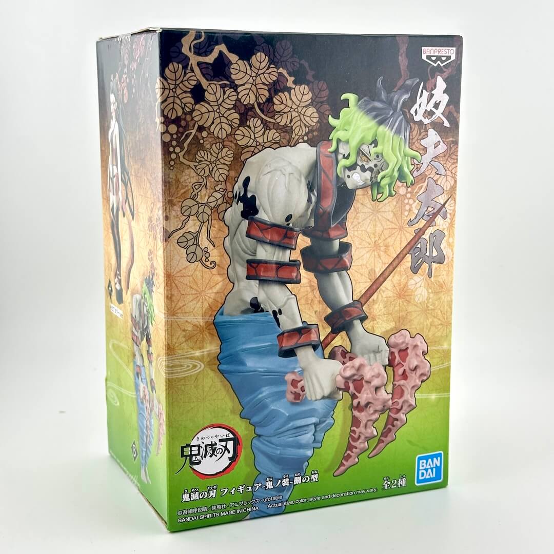 BANDAI collectible figure box from Demon Slayer, featuring illustrated artwork of the character.